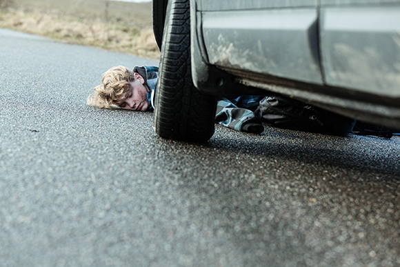 Injured Child lying in the road