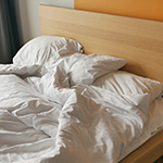 Messy unmade bed