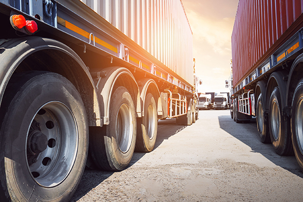 Parking lot filled with Semi-trucks
